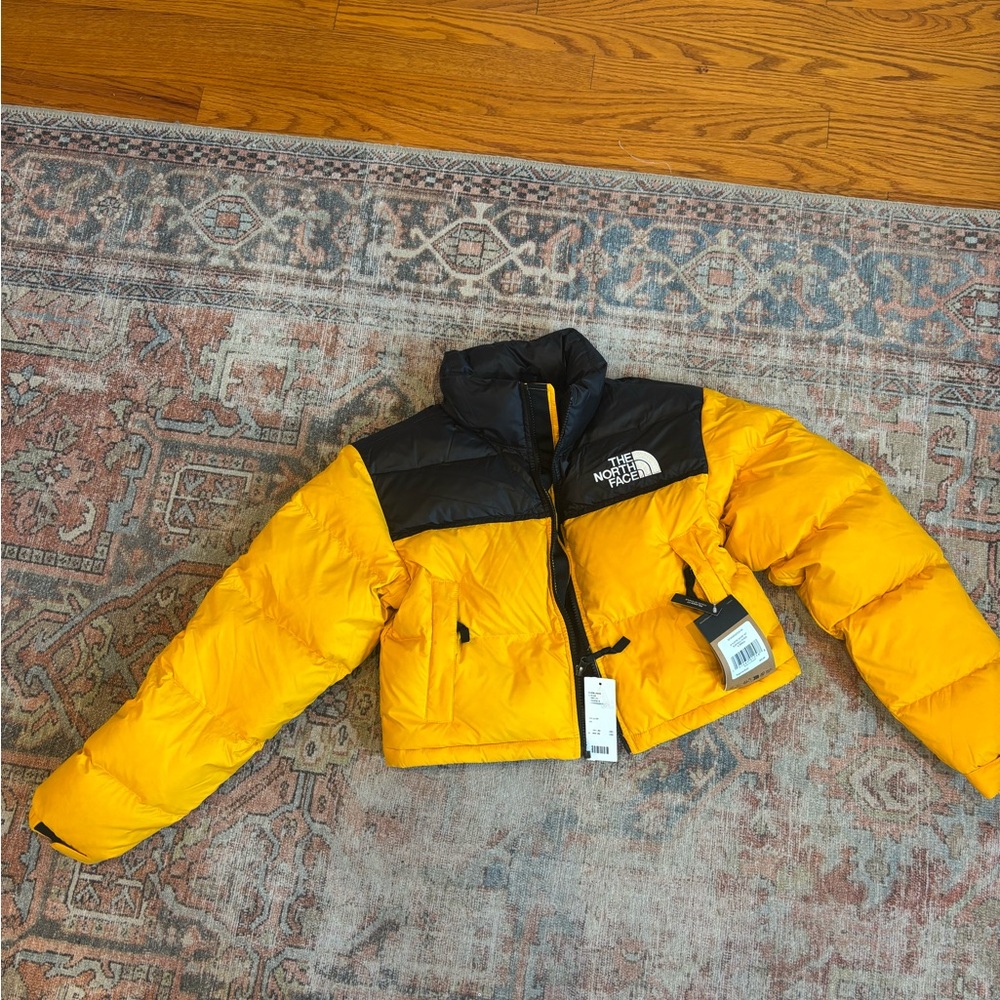 The North Face Yellow and Black Puffer Jacket